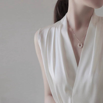 SILKY SLEEVELESS BLOUSE